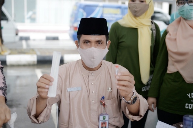 HUT Riau Ke-63 Pemprov Riau Lakukan Swab Massal Bagi ASN Cegah Covid-19, juga diikuti Kepala DKP Riau